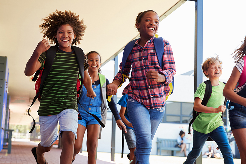 School children running through the halls