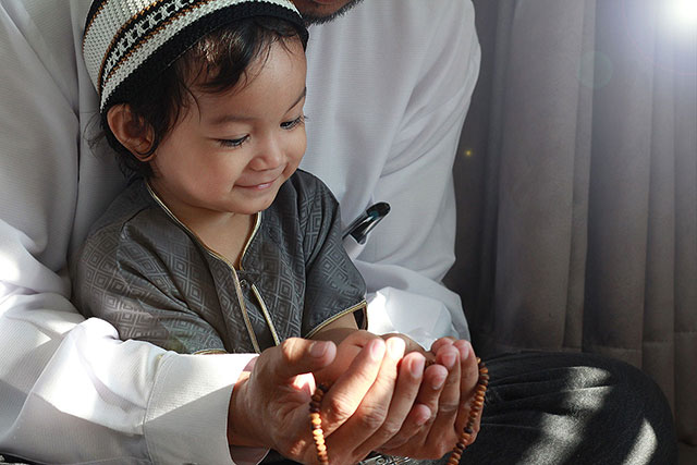 muslim man and son